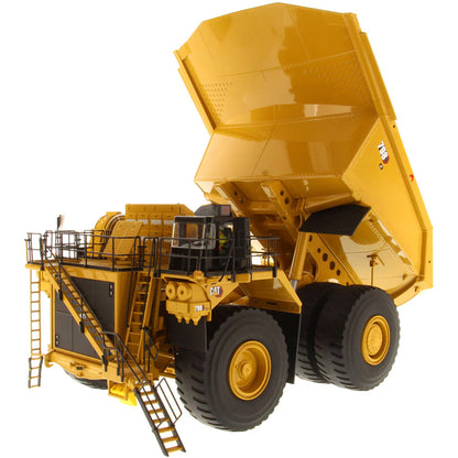 Model of a Large Caterpillar 798 AC Off Highway Electric Drive Mining Dump Truck on a White Background