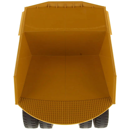 Model of a Large Caterpillar 798 AC Off Highway Electric Drive Mining Dump Truck on a White Background