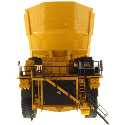 Model of a Large Caterpillar 798 AC Off Highway Electric Drive Mining Dump Truck on a White Background
