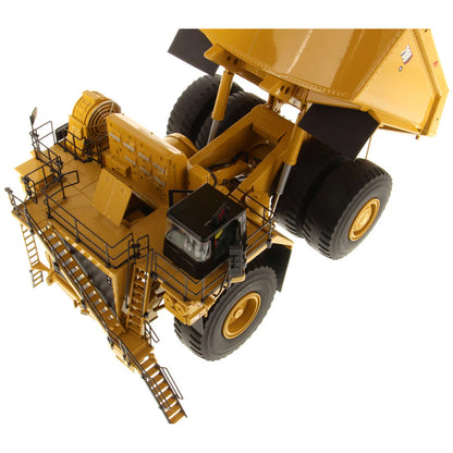 Model of a Large Caterpillar 798 AC Off Highway Electric Drive Mining Dump Truck on a White Background
