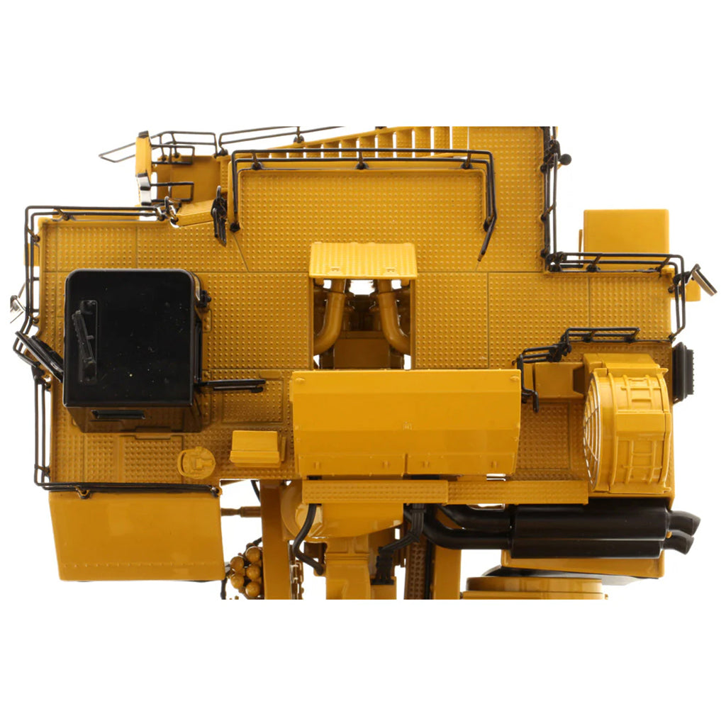 Model of a Large Caterpillar 798 AC Off Highway Electric Drive Mining Dump Truck on a White Background