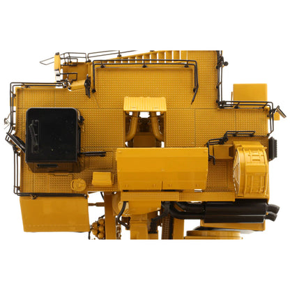 Model of a Large Caterpillar 798 AC Off Highway Electric Drive Mining Dump Truck on a White Background