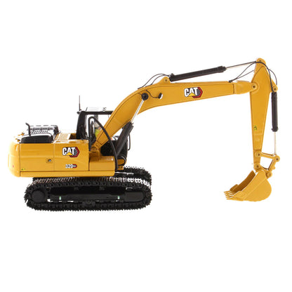 Model of a Caterpillar 320 GX Hydraulic Excavator on a White Background
