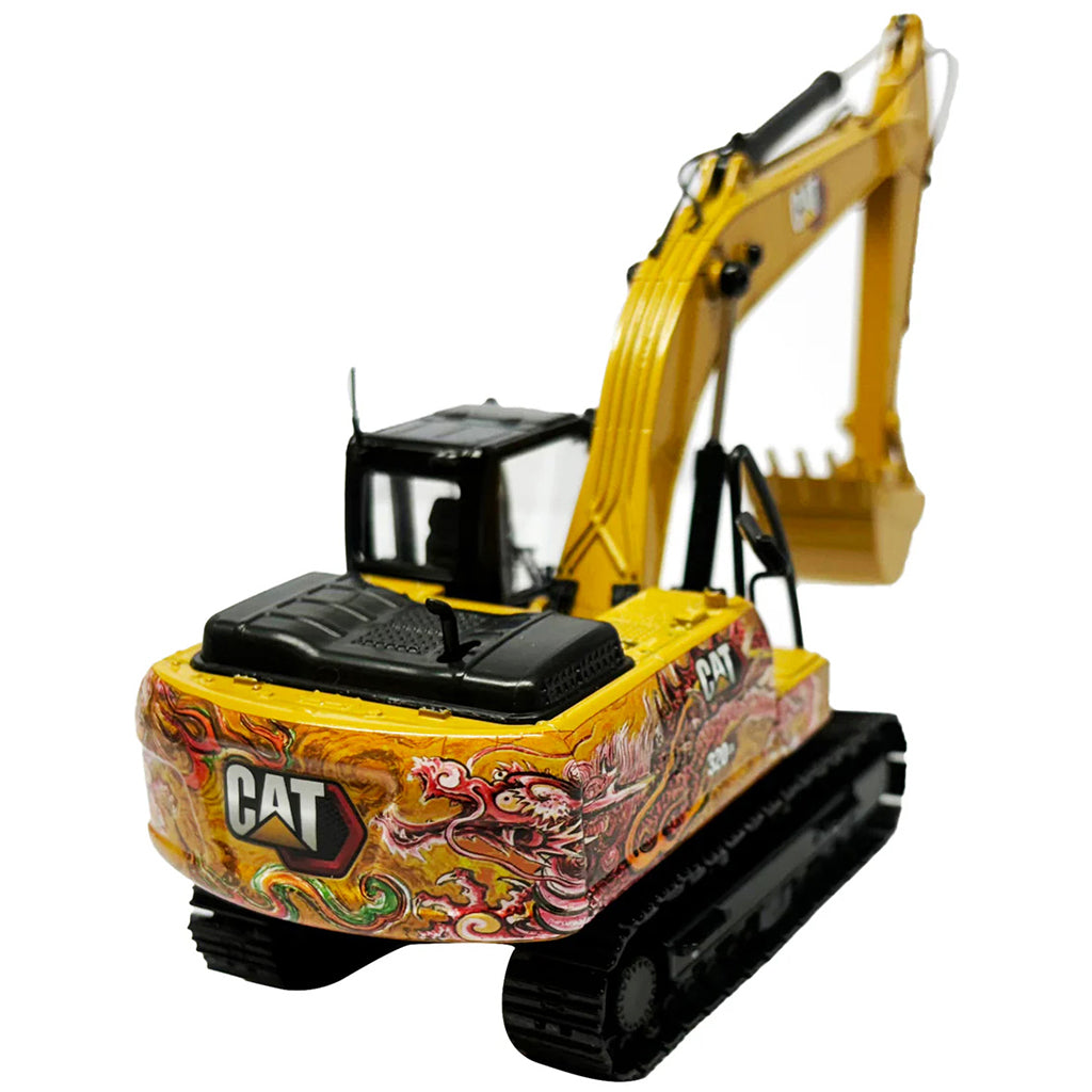 Model of a Caterpillar 320 GX Hydraulic Excavator with Special Dragon Totem design to celebrate the Chinese Year of the Dragon on a White Background