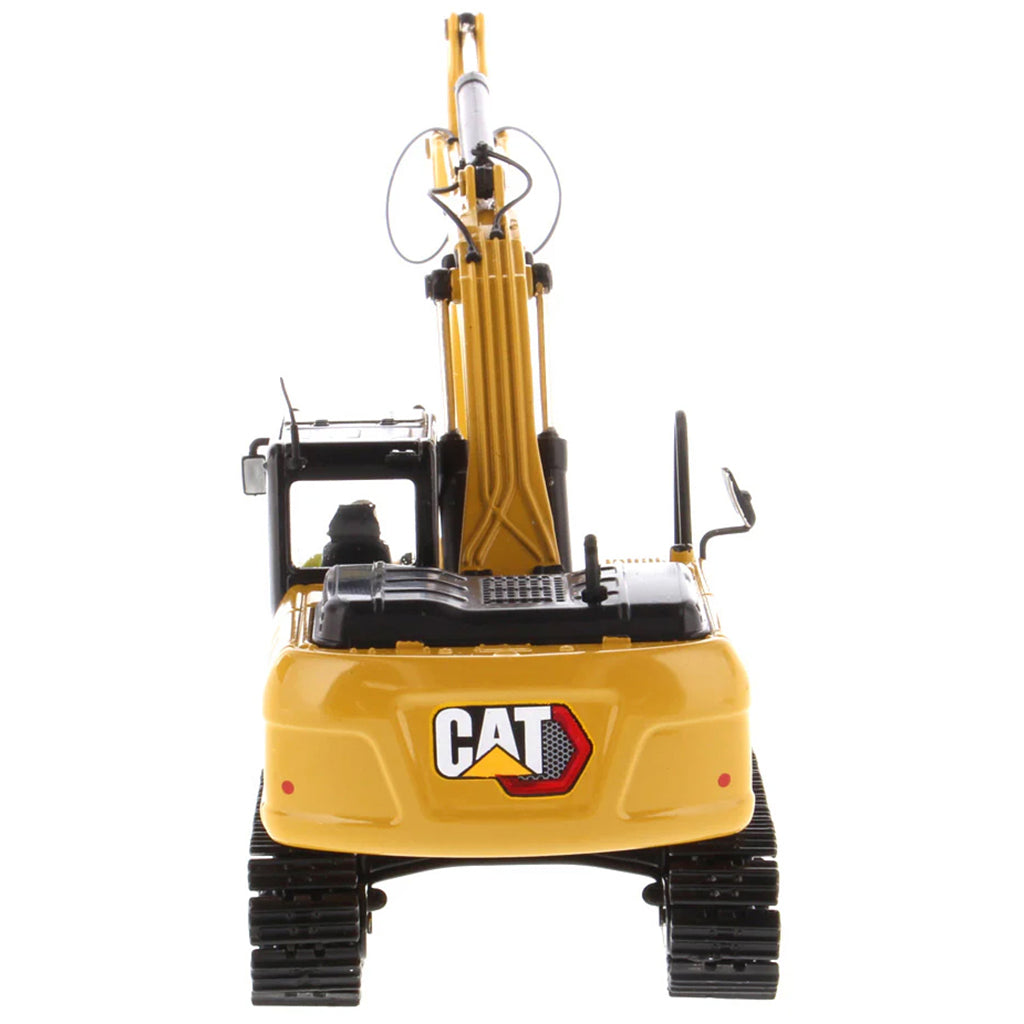 Model of a Caterpillar 323GX Hydraulic Excavator on a White Background