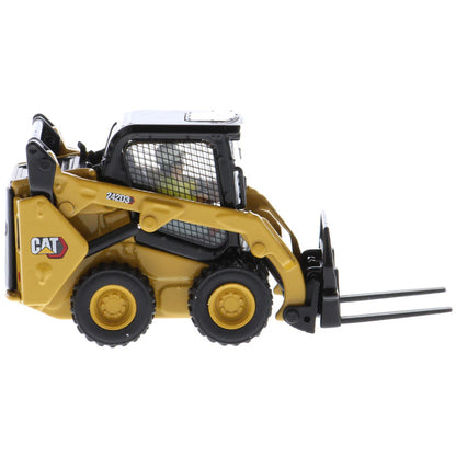 Model of a Yellow and Black Caterpillar 242D3 Skid Steer Loader on a White Background