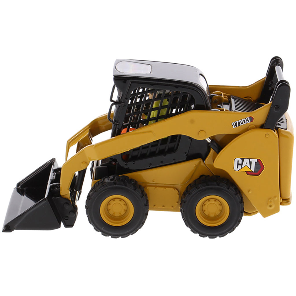 Model of a Caterpillar 272D3 Skid Steer Loader on a White Background