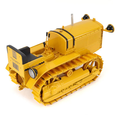 Model of a CAT Machine Yellow Caterpillar Twenty-Five Crawler Tractor with Headlights on a White Background