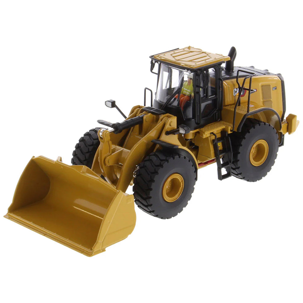 Model of a Yellow Caterpillar 972XE Wheel Loader on a White Background