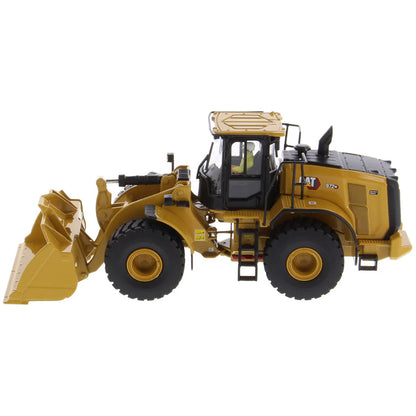 Model of a Yellow Caterpillar 972XE Wheel Loader on a White Background