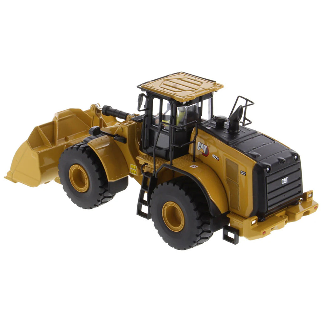 Model of a Yellow Caterpillar 972XE Wheel Loader on a White Background