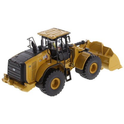 Model of a Yellow Caterpillar 972XE Wheel Loader on a White Background