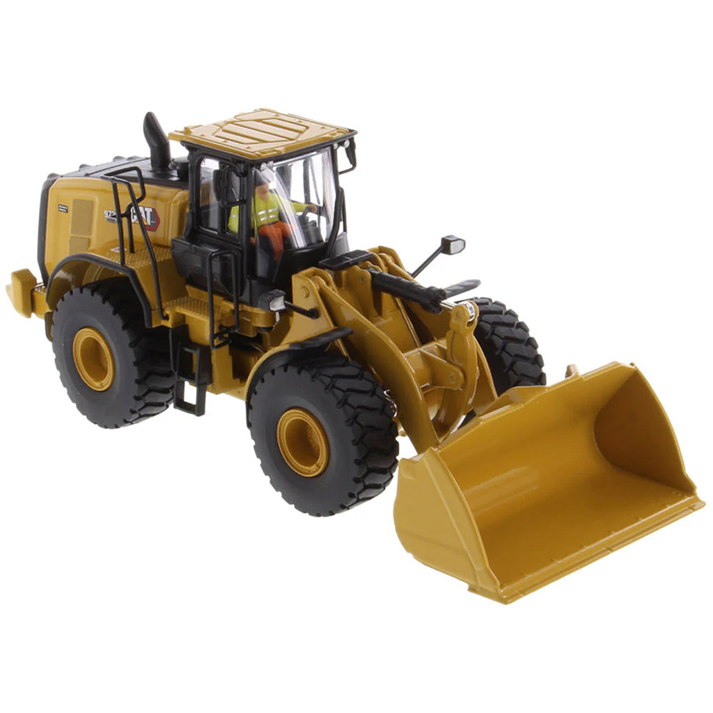 Model of a Yellow Caterpillar 972XE Wheel Loader on a White Background