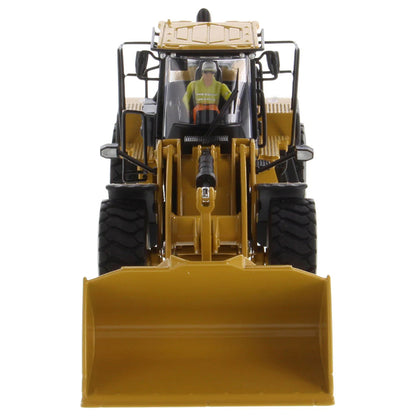 Model of a Yellow Caterpillar 972XE Wheel Loader on a White Background
