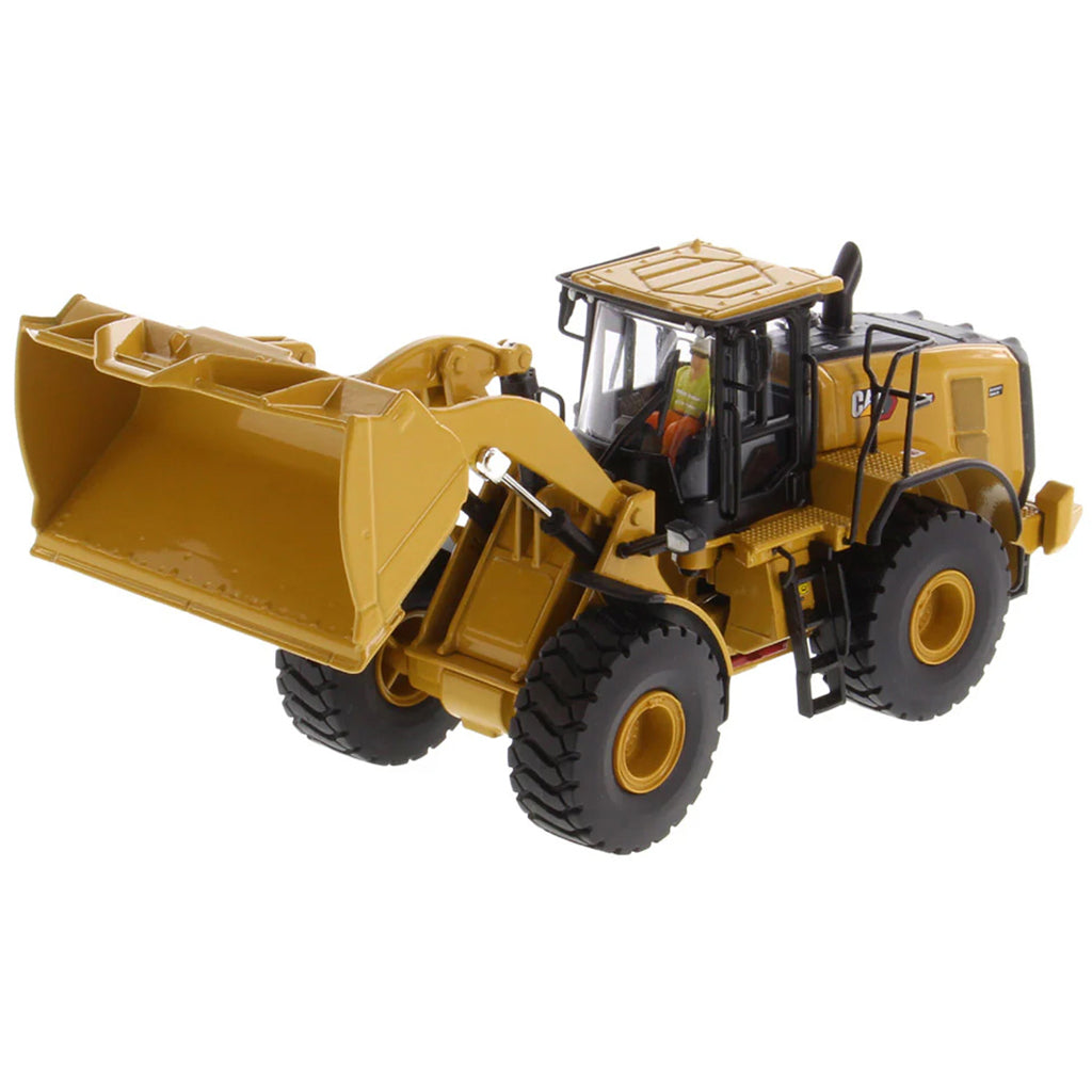 Model of a Yellow Caterpillar 972XE Wheel Loader on a White Background