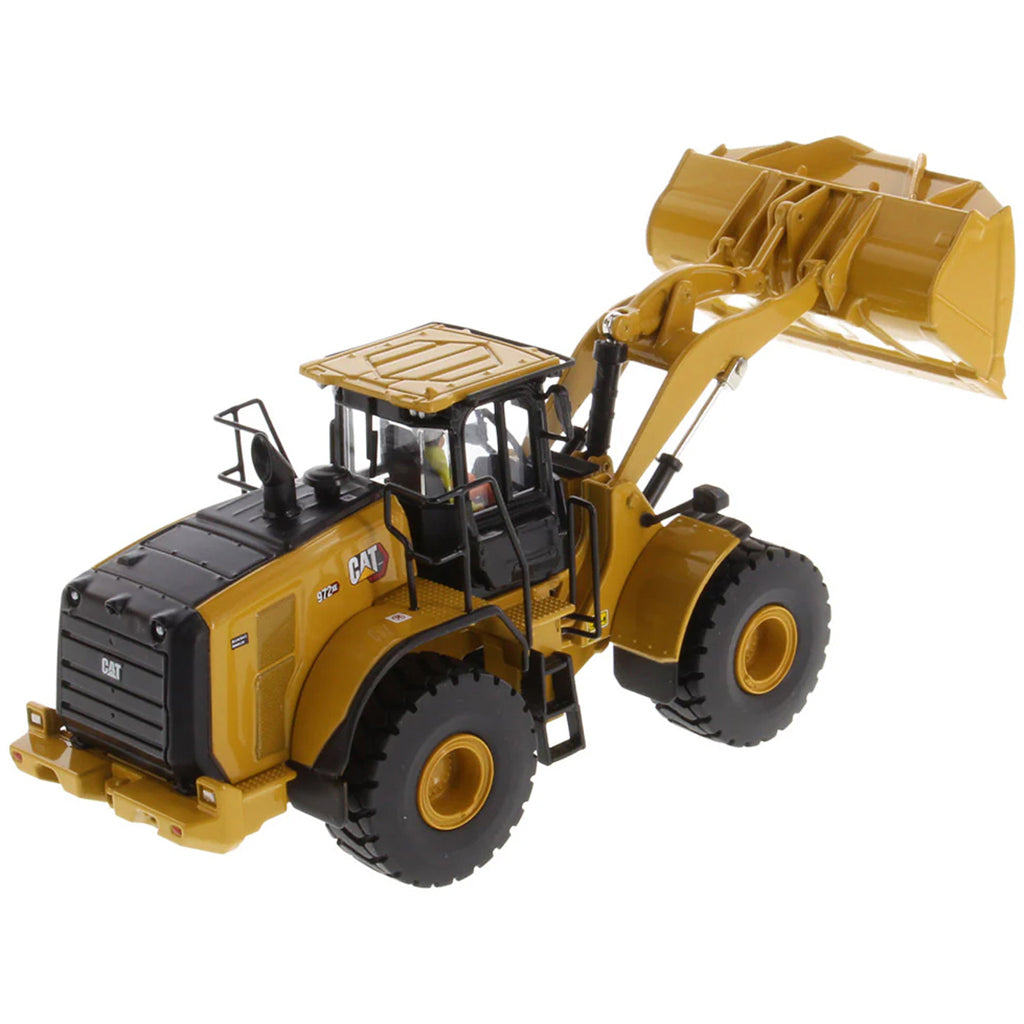 Model of a Yellow Caterpillar 972XE Wheel Loader on a White Background