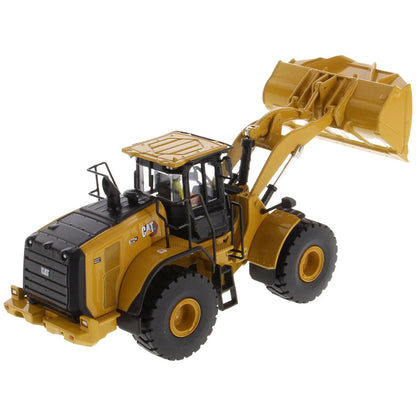 Model of a Yellow Caterpillar 972XE Wheel Loader on a White Background
