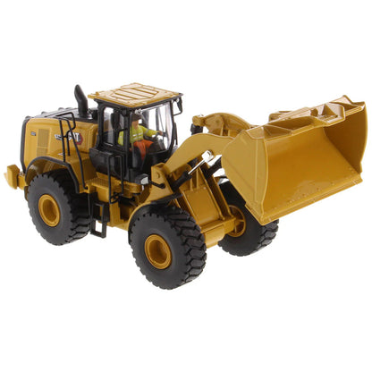 Model of a Yellow Caterpillar 972XE Wheel Loader on a White Background