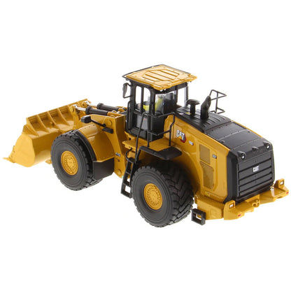 Model of a Yellow Caterpillar 980 Wheel Loader on a White Background