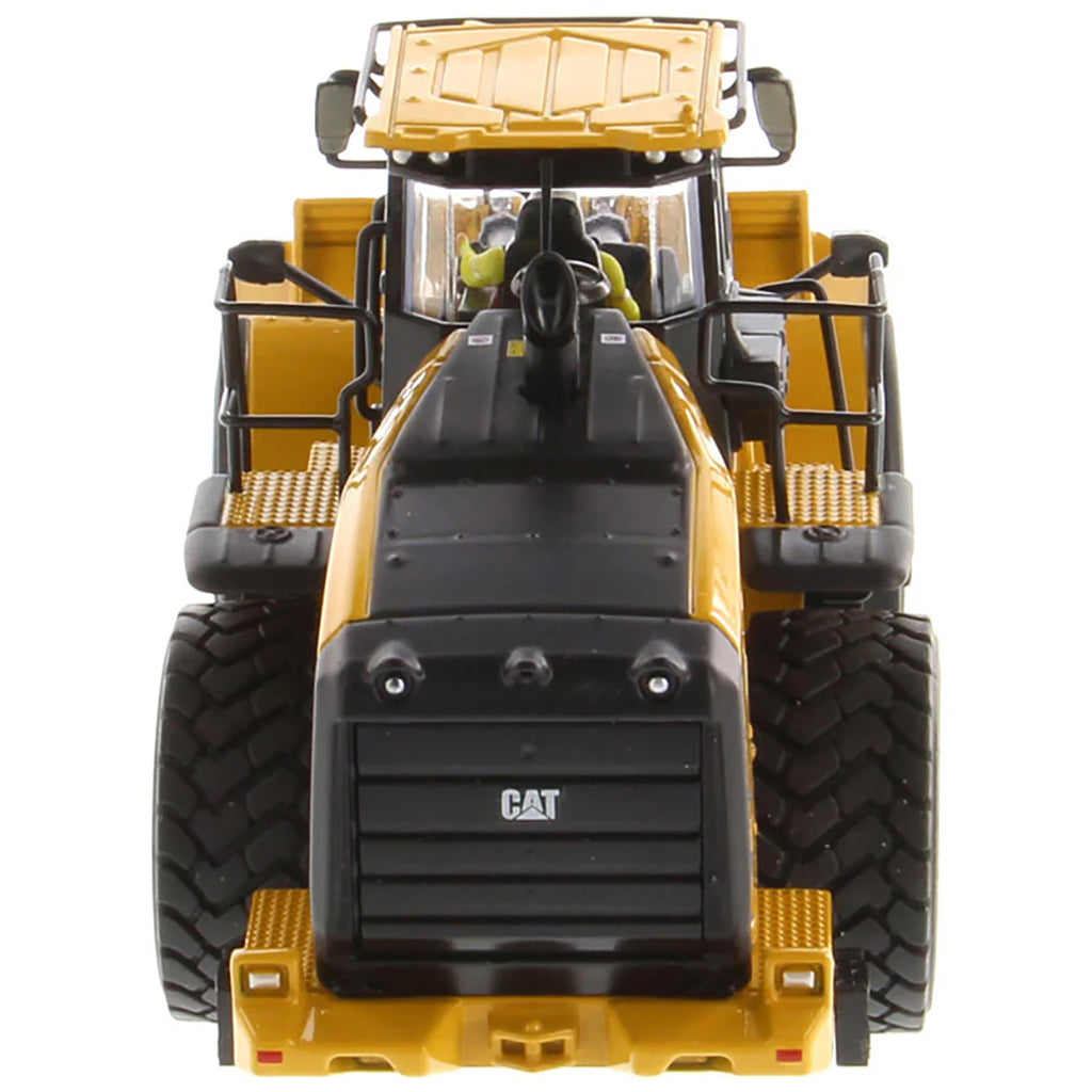 Model of a Yellow Caterpillar 980 Wheel Loader on a White Background