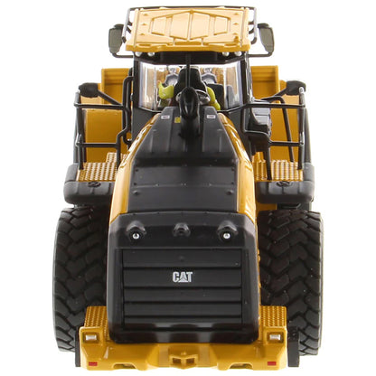 Model of a Yellow Caterpillar 980 Wheel Loader on a White Background