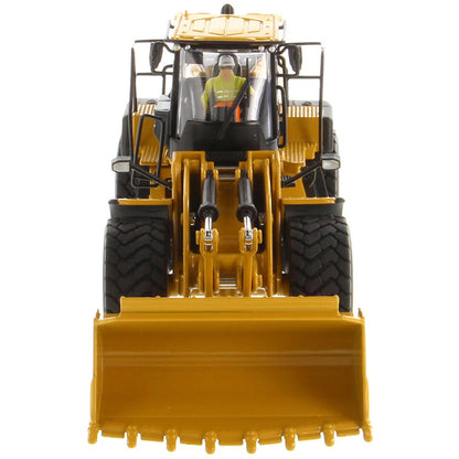 Model of a Yellow Caterpillar 980 Wheel Loader on a White Background