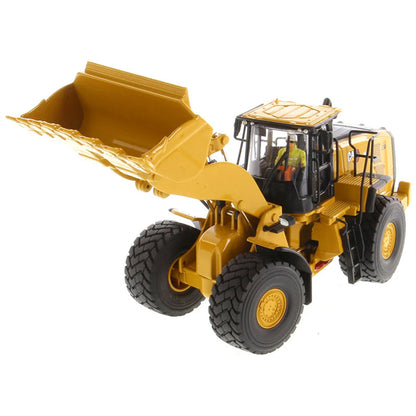 Model of a Yellow Caterpillar 980 Wheel Loader on a White Background