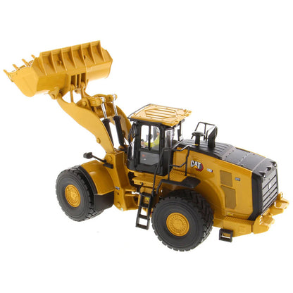 Model of a Yellow Caterpillar 980 Wheel Loader on a White Background