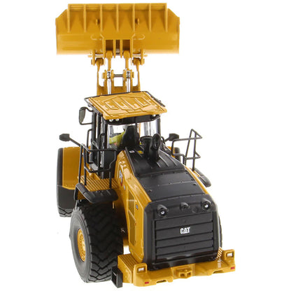 Model of a Yellow Caterpillar 980 Wheel Loader on a White Background