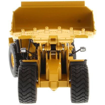Model of a Yellow Caterpillar 980 Wheel Loader on a White Background