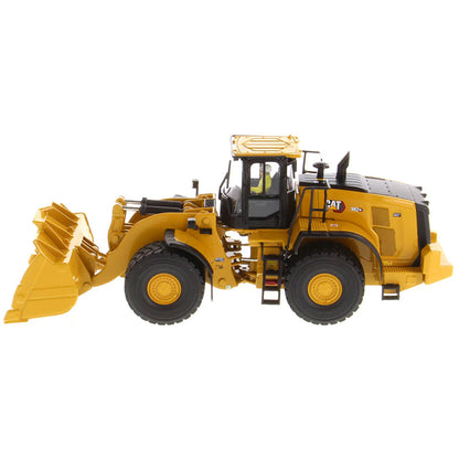Model of a Caterpillar 982 XE Wheel Loader on a White Background