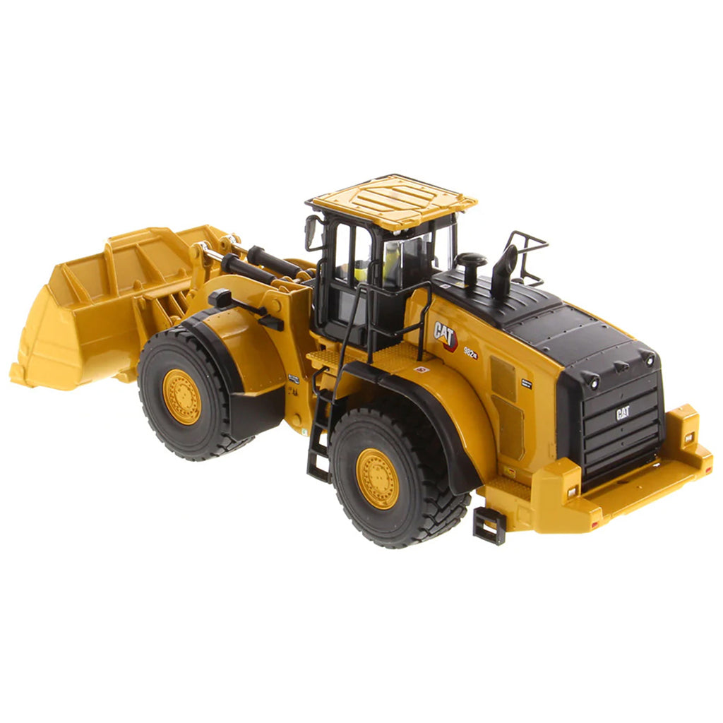 Model of a Caterpillar 982 XE Wheel Loader on a White Background