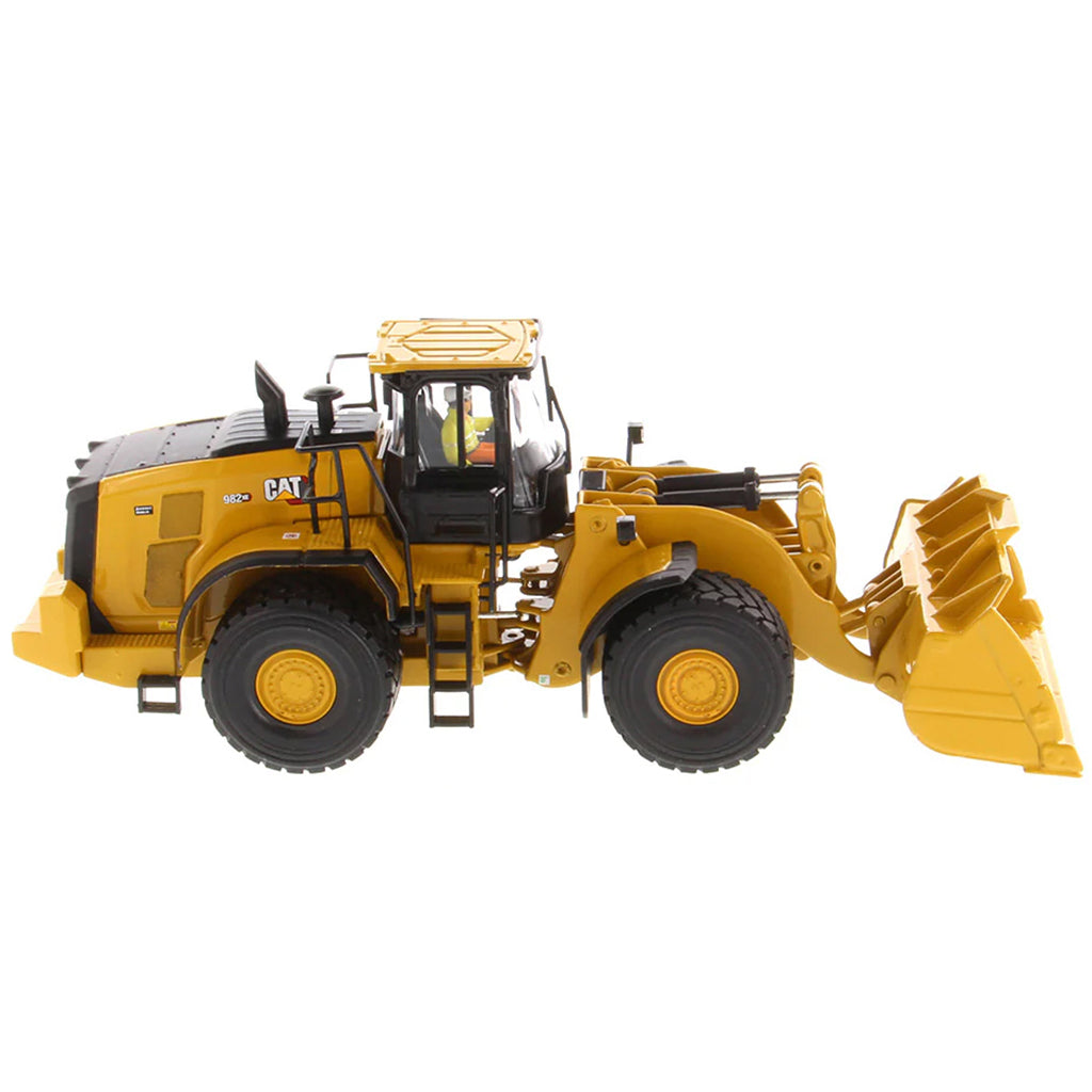 Model of a Caterpillar 982 XE Wheel Loader on a White Background