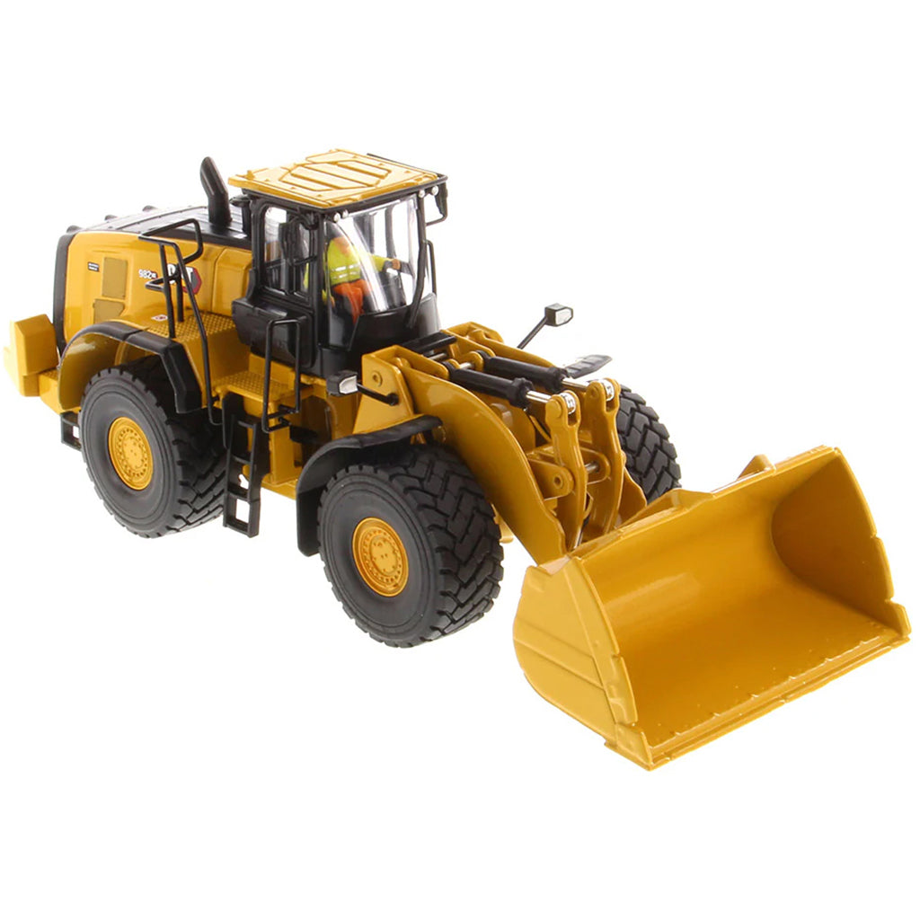 Model of a Caterpillar 982 XE Wheel Loader on a White Background