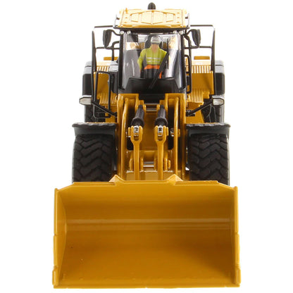 Model of a Caterpillar 982 XE Wheel Loader on a White Background
