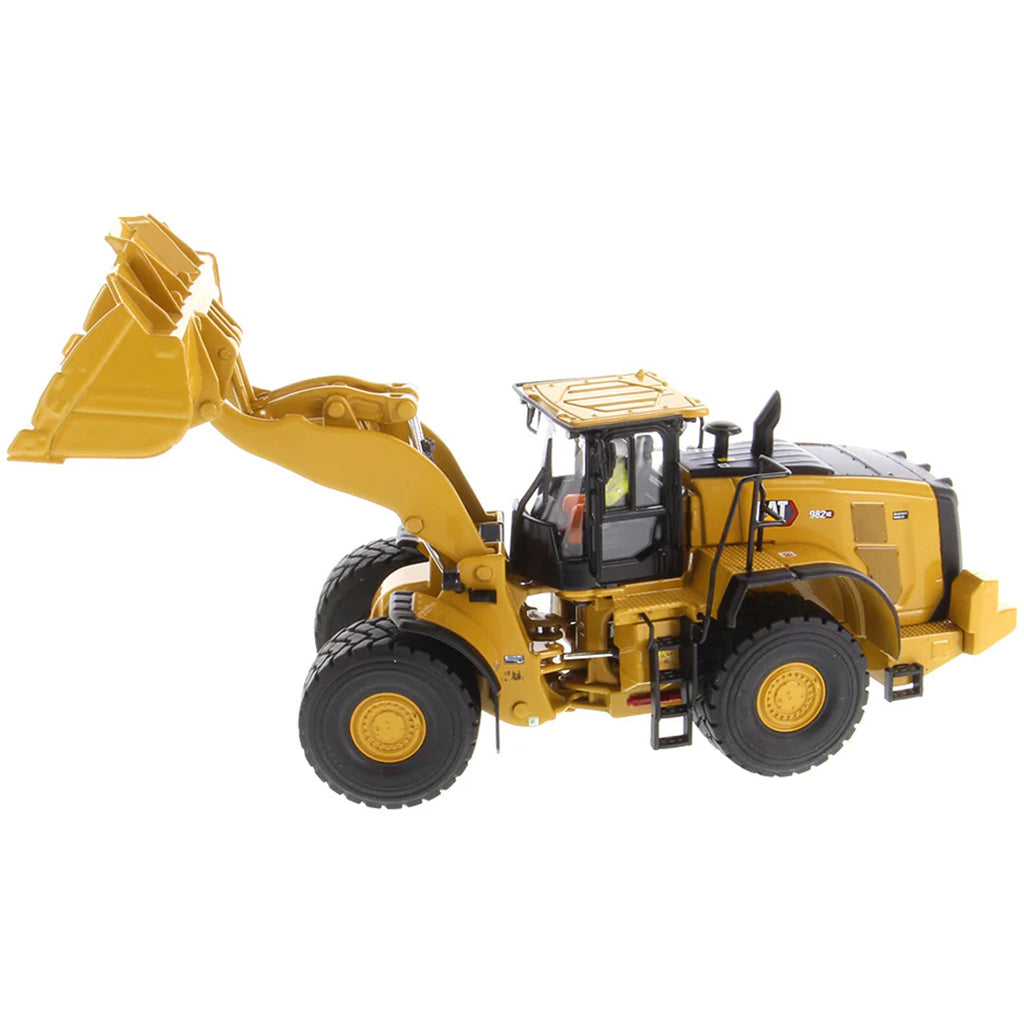 Model of a Caterpillar 982 XE Wheel Loader on a White Background