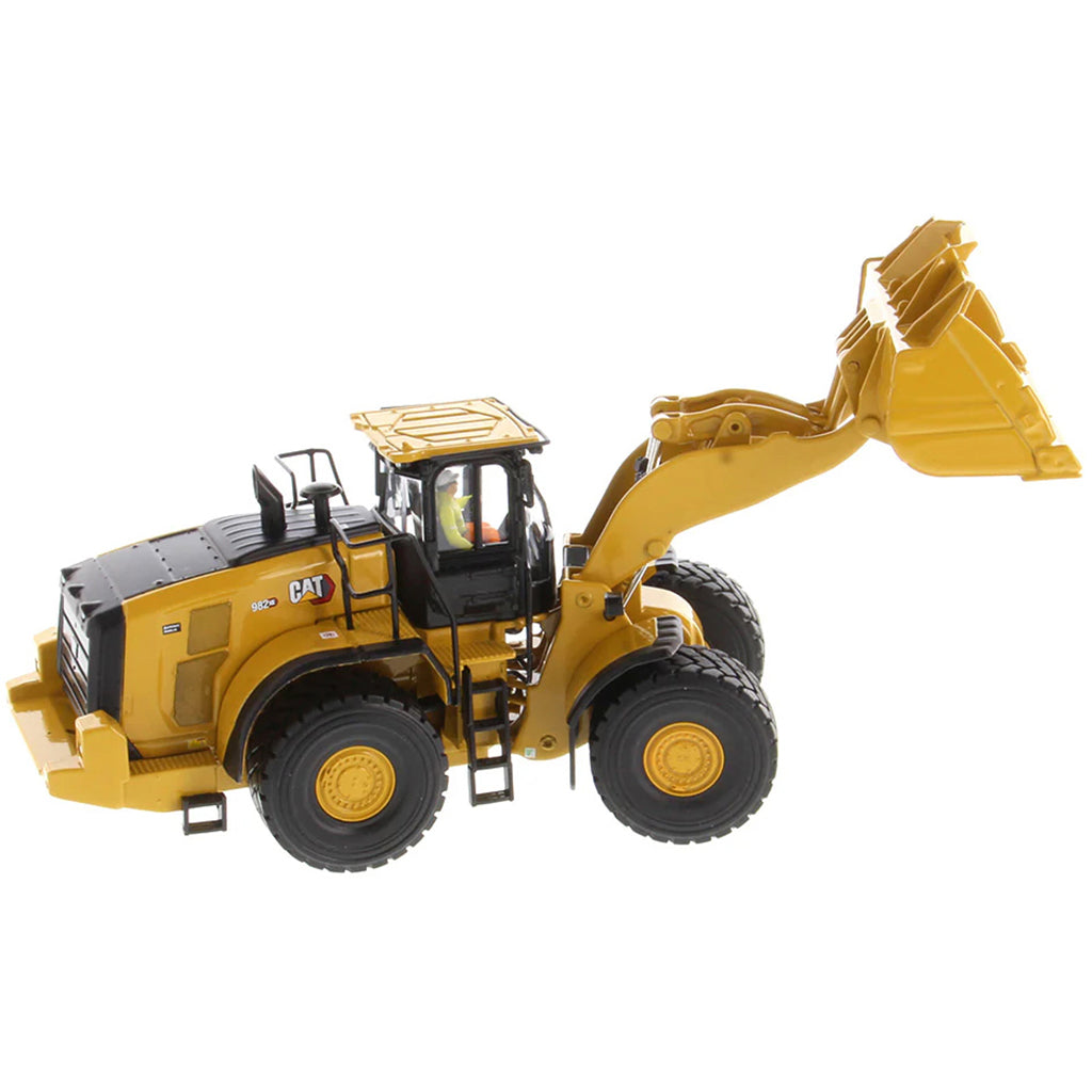 Model of a Caterpillar 982 XE Wheel Loader on a White Background