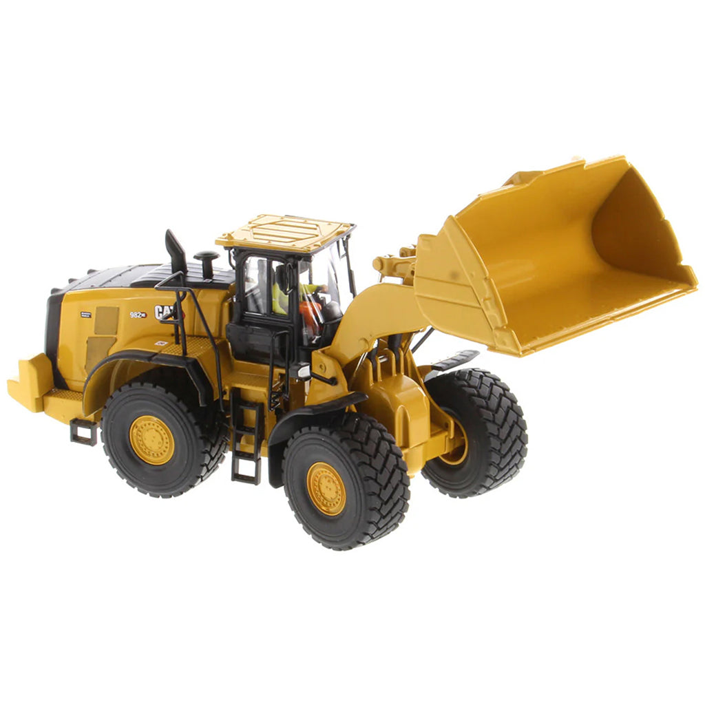 Model of a Caterpillar 982 XE Wheel Loader on a White Background