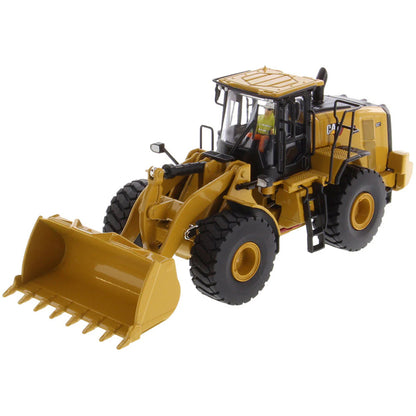 Model of a yellow Caterpillar 966 Wheel Loader construction vehicle on a white background