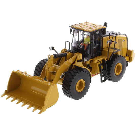 Model of a yellow Caterpillar 966 Wheel Loader construction vehicle on a white background