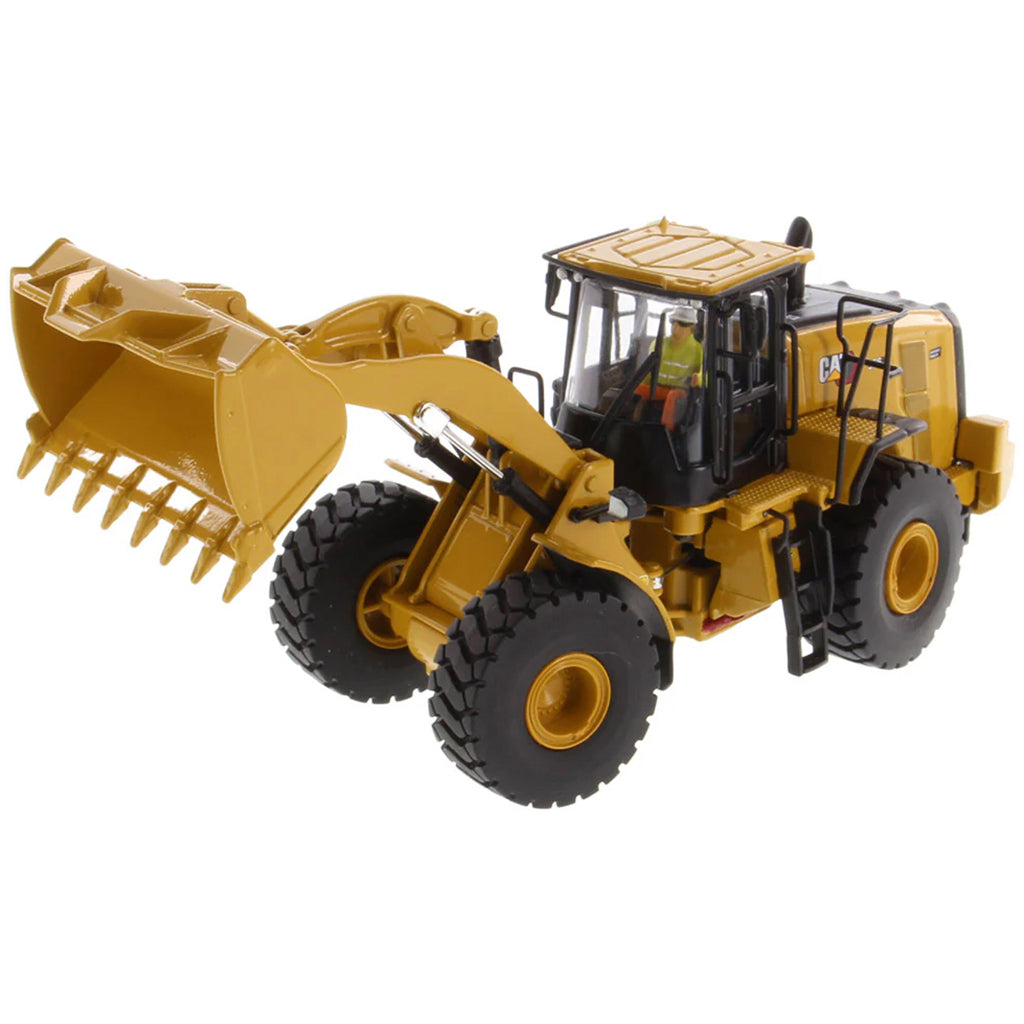 Model of a yellow Caterpillar 966 Wheel Loader construction vehicle on a white background