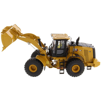 Model of a yellow Caterpillar 966 Wheel Loader construction vehicle on a white background