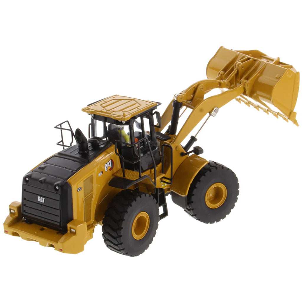 Model of a yellow Caterpillar 966 Wheel Loader construction vehicle on a white background