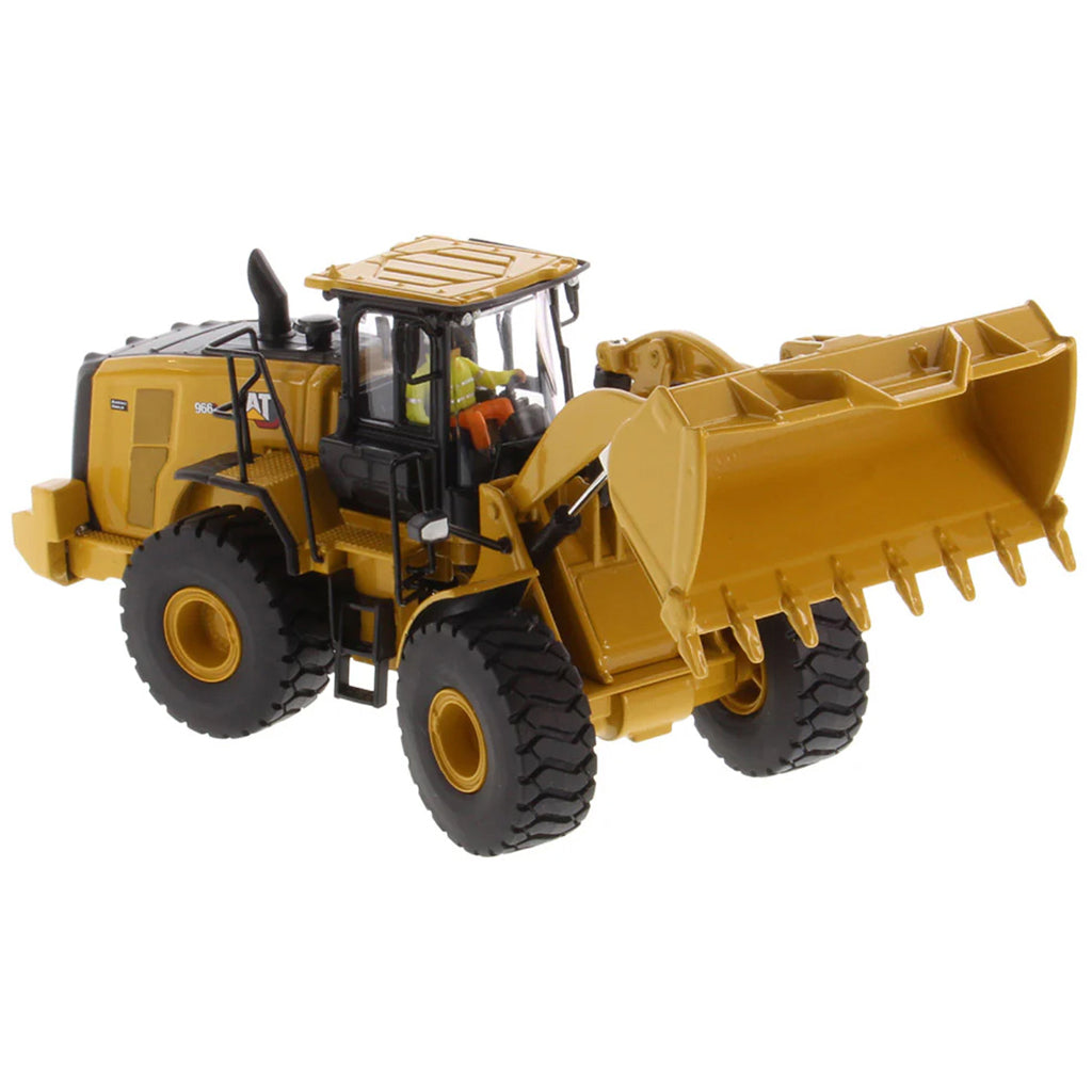 Model of a yellow Caterpillar 966 Wheel Loader construction vehicle on a white background