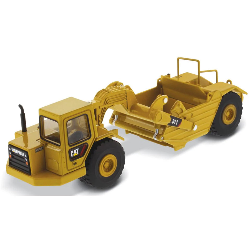 Model of a Caterpillar 611 Wheel Tractor Scraper on a White Background