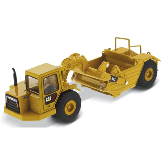 Model of a Caterpillar 611 Wheel Tractor Scraper on a White Background
