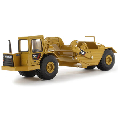 Model of a Caterpillar 611 Wheel Tractor Scraper on a White Background