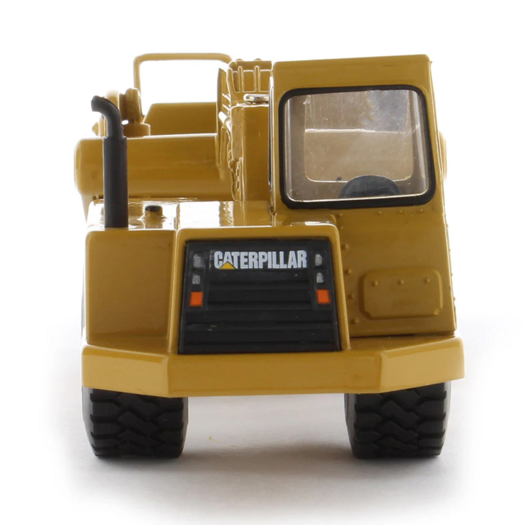 Model of a Caterpillar 611 Wheel Tractor Scraper on a White Background