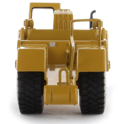 Model of a Caterpillar 611 Wheel Tractor Scraper on a White Background