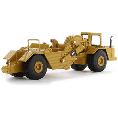 Model of a Caterpillar 611 Wheel Tractor Scraper on a White Background